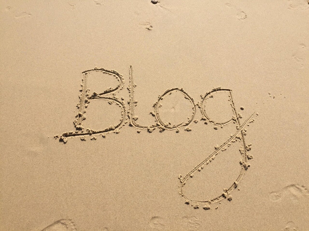 Blog Image of the word Blog in the sand